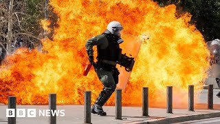 Athens police clash with protesters over Greece train crash - BBC News