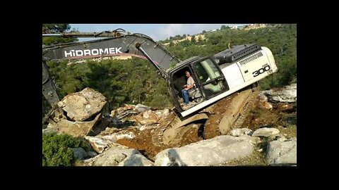 Removing large stones with Hidromek 300 Removing stones is never easy.