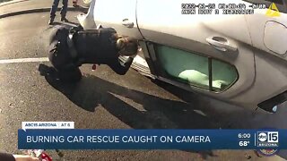 Phoenix officers save man from burning car