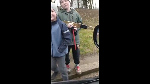 Language discrimination and racism in Ukraine. Kids set up a fake checkpoint hunting for Russian-speakers