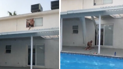 Man Trying to Jump From the Roof Into the Pool