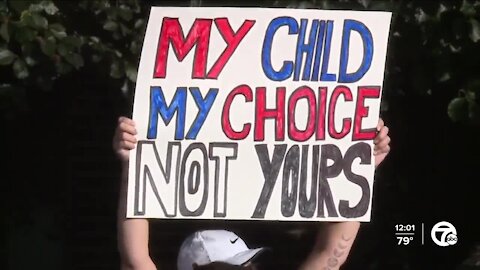 Dozens gather outside Oakland County Health Department to protest school mask mandate