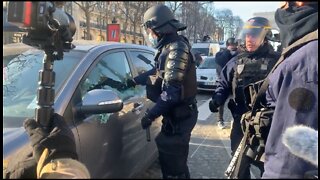 Paris Police Break Window Of Freedom Convoy Protestor