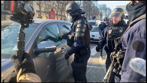 Paris Police Break Window Of Freedom Convoy Protestor