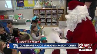 Claremore Police give toys to elementary students