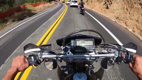 Racing Suzuki DR-Z400 motorcycles to the Candy Shop
