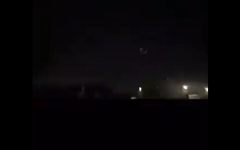 A Lunar Eclipse at night!2 Moons? Black Sun?