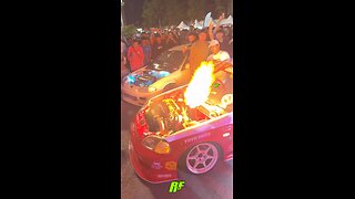 Hatchback Honda Civic with massive flames