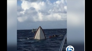 Family rescued after boat sinks during vacation