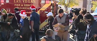Southern Nevada firefighters surprise children with Christmas toys