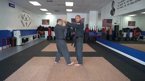 Executing the American Kenpo technique Twisted Twig