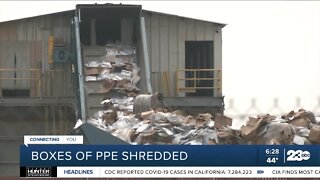 Boxes of plastic PPE shields shredded