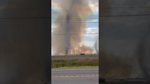 Rare moment two fiery dust devils spotted over farmland