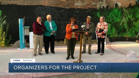 Black Rock neighborhood cuts ribbon at the newly done "Market Square Park"