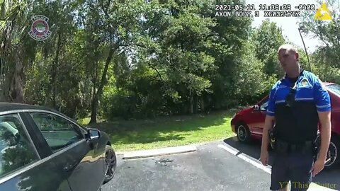 Sarasota Police release body cam footage of officer saving dog from hot car