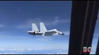 U.S. military plane takes evasive maneuvers after Chinese fighter jet flies within 10 feet (Video)