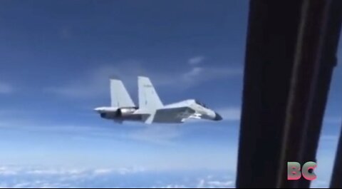 U.S. military plane takes evasive maneuvers after Chinese fighter jet flies within 10 feet (Video)