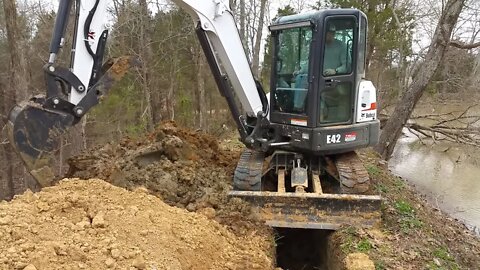 FIXING A POND DAM LEAK! Start to finish! Bobcat MINI Excavator!