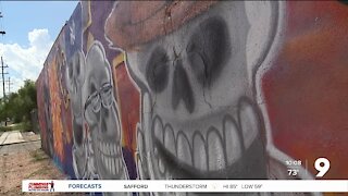 Local artists honor Dia De Los Muertos in new mural