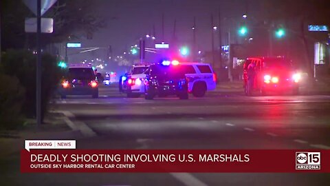 Murder suspect shot, killed by U.S. Marshals near Sky Harbor rental car facility