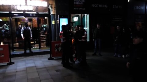 THREE SECURITY GUARDS GRAB A MAN IN LEICSTER SQUARE
