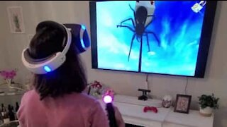 Woman panics while paying virtual reality game