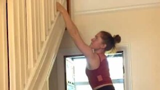 Pilates instructor does climbing at home