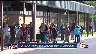 School criticized for allowing prayer at events, students pray in response