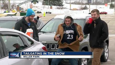 Snow and freezing temperatures don't stop Brewers tailgaters