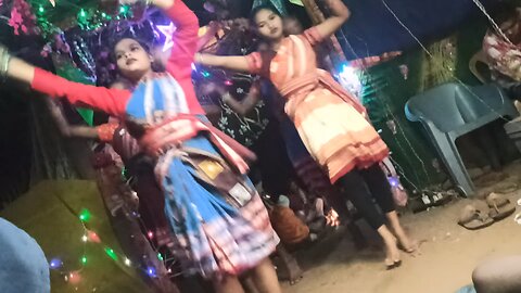 mini and jhuli dancing in a program