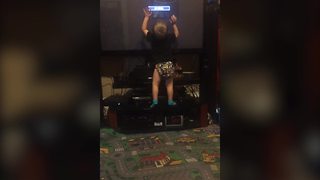 Tot Kid Plays With TV As It Were A Touch Screen Tablet