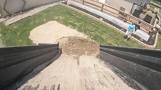 Delivering Sand for a Pool. Dump Trailer Hauling.