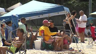 Families celebrate Labor Day weekend at beach despite COVID-19 concerns