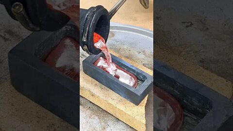Pouring Molten Aluminum into an Ingot Mold