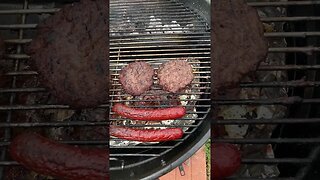 Hamburgers and Hotdogs on the kettle grill