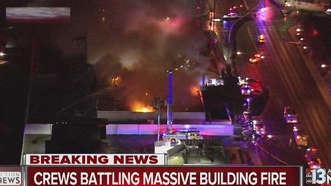 Massive building fire reported near Pecos, Desert Inn