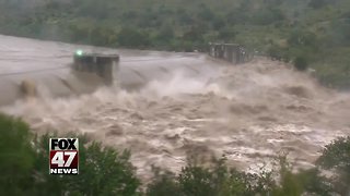 A flooded Texas river rose 35 feet in a day and crushed a bridge
