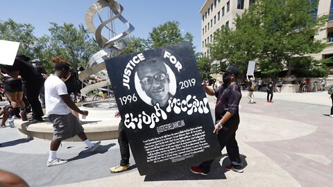 Officers Fired After Taking Photos At Elijah McClain Memorial