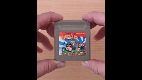 The First Wario game. Wario Land: Super Mario Land 3 for the Game Boy loaded in Nintendo Game Boy Deep Black Console