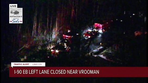 Police activity blocks left lane of I-90 EB just after Vrooman Road in Lake County