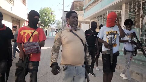 Haiti gang leader will consider ceasefire but warns foreign forces will be treated as 'invaders'