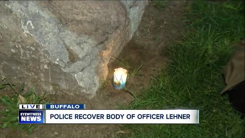 Officers light candle in memory of Diver Craig Lehner