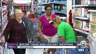 Anquan Boldin takes kids shopping (Cheribundi Boca Bowl)