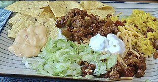 Mexican Feast: beef & rice burrito and deluxe nachos