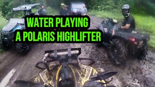 Water playing with a Polaris highlifter