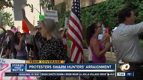 Protesters swarm Hunters' arraignment