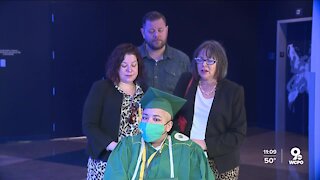 Sycamore senior diagnosed with brain tumor walks across graduation stage