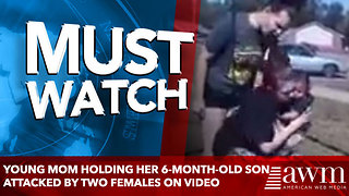 Young mom holding her 6-month-old son attacked by two females on video