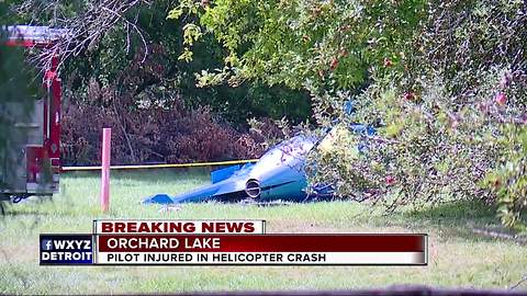 Pilot rescued from being trapped after private helicopter crash in Orchard Lake