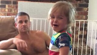Dad stops daughter crying with foolproof trick!